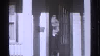Danielson Connecticut (1939): A Family Coming Out Of A House Together Who Are On