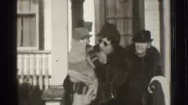 Danielson Connecticut (1939): Two Adults In Thick Fur Coats Walk Out Of A House