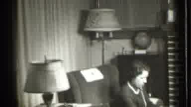 Danielson Connecticut (1939): Woman Wearing Grey And White Robe Sits In Grey Chair