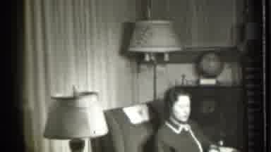 Danielson Connecticut (1939): Woman Wearing Black And White Robe Sits In Grey