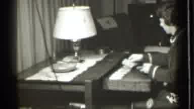 Danielson Connecticut (1939): Older Woman Short Hair Playing A Card Game By
