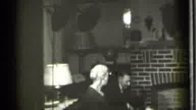 Danielson Connecticut (1939): People In Black Sitting In A Dark Room With Lamp