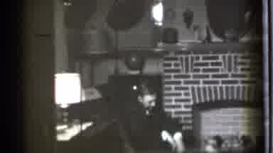 Danielson Connecticut (1939): Man Sitting Down Looking At The Floor As Someone