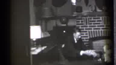 Danielson Connecticut (1939): Man Sitting In Chair In The Dan Plays With Toddler