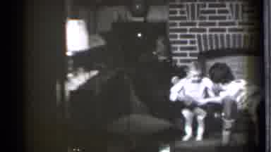 Danielson Connecticut (1939): A Father Mother And Child Tickle The Belly Of A