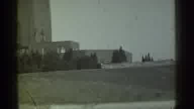 Danielson Connecticut (1939): A Building With A Tall Tower And Two Lower Levels