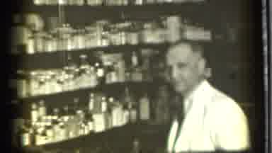 Danielson Connecticut (1939): Black And White A Man Is Working Inside In A