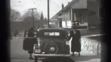 New York (1939): Man And Woman At Eur Side Of Car Irked In Suburb Neighborhood