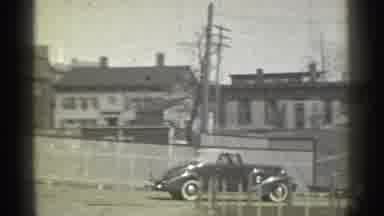 New York (1939): Man In Car Pulling Out Of Driveway And Backing Up