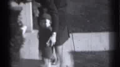 New York (1939): Toddler Guided By Rent Long Sidewalk In A Residential