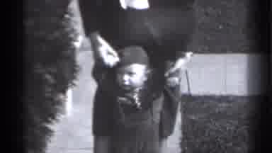New York (1939): Boy Outside Being Helped To Walk By Woman