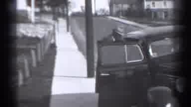New York (1939): Man Pulling Child Out Of Style Black Car