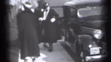 New York (1939): Person In Big Black Cot Coming Out Of Her Car Father Some Meson