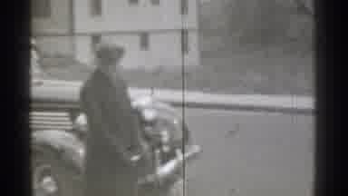 New York (1939): Smartly Dressed Woman Pushes Young Child Down Sidewalk In