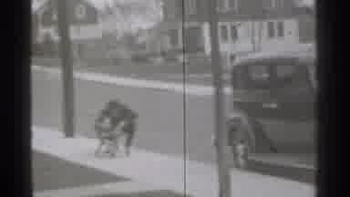 New York (1939): Man Wearing Black Suit Pushes Baby Stroller On Cleo Day