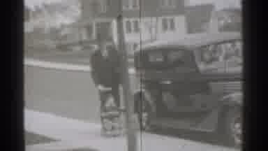 New York (1939): Man Very Happily Ekes His Child In Small Wheelchair And Baby Goes