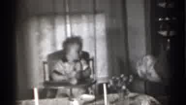 New York (1939): Mom Picks Up Spoon Dropped By Baby