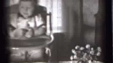 New York (1939): Toddler In High Chair Playing With Cup