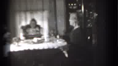 New York (1939): Woman Es At Table While Baby Sits At High Chair And Plays With A