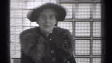 San Francisco California (1944): Woman Wearing Fur Stole Looks At Comer While