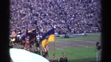 San Francisco California (1944): Marching Band And Flag Caries Coming Across Field