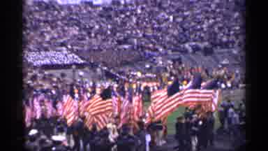 San Francisco California (1944): People Holding Flags Marching In Stadium