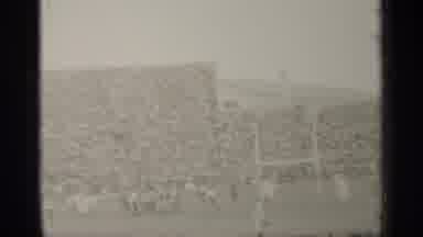San Francisco California (1944): Large Stadium With People Running Down Football