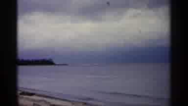 Michigan USA (1960): Cl Sea With Eves Embracing Sandy Earshot On Daytime