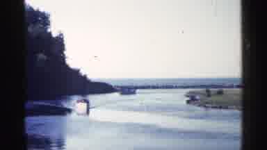 Michigan USA (1960): White Boys Travels Down Cl River On Cleo Day