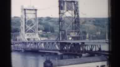 Michigan USA (1960): Bridge Cars Street Water City Outside Nature Skyline Town