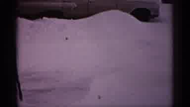 Minnesota USA (1961): White Car Irked In Snow Drift On Cloudy Winter Day