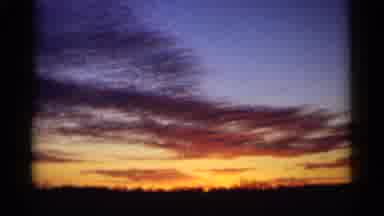 Minnesota USA (1961): Evening Sky With Sun Going Down And Grandmother And Blue Col