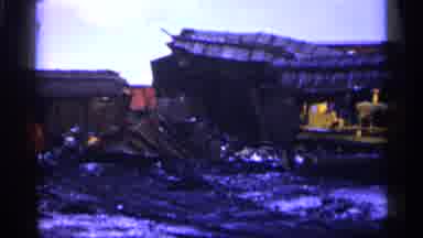 Minnesota USA (1961): People Sand Round At Dump Next To Cars Piled On Top Of Each