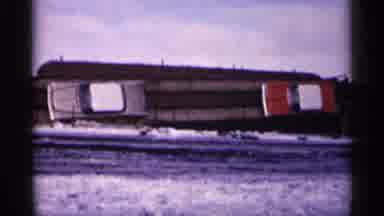 Minnesota USA (1961): Distant Viewing Of Cars Lying Haphazardly In Junkyard Father