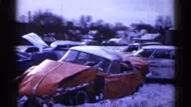 Minnesota USA (1961): Snowy Junkyard Filled With Wrecked Cars
