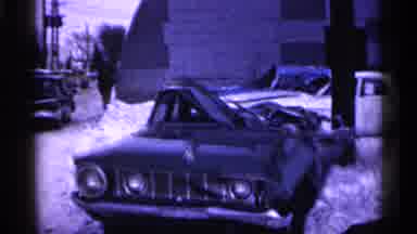 Minnesota USA (1961): Wrecked Red And White Car In Snow On Side Of Street