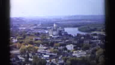 Minnesota USA (1961): Grey City In Distance Surrounded By Trees