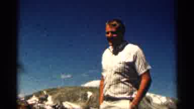 Colorado USA (1963): Kids Playing With Each Other Down Hill As People Watch A