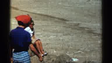 Colorado USA (1963): Some People Who Are Walking Long Beach Together Picking Up