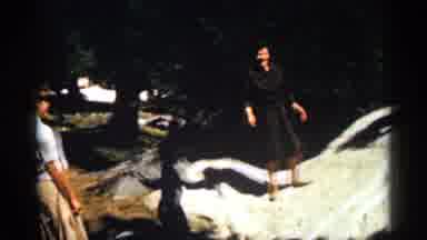 Colorado USA (1963): Man Sliding Down Side Of Rock
