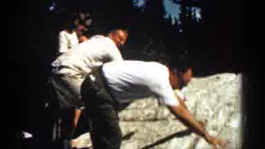 Colorado USA (1963): Two Men And One Woman Outdo Others Sun Trees Rock Moving