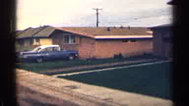 Colorado USA (1963): Cars Irked By Neighborhood Houses On Cloudy Day