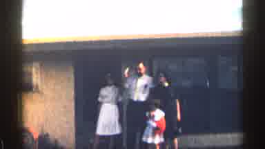 Colorado USA (1963): Family Standing Outside Home Having A Awkward Interaction