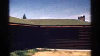 Colorado USA (1963): People Line Up Outside Of Log Bin S Comer Ens Cross Building