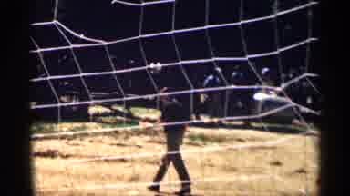 Colorado USA (1963): Man Walking Next To Hammock Mountains And Blue Sky