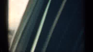 Colorado USA (1963): Cars Driving Past Cell Tower And Woods Filled With Tree And