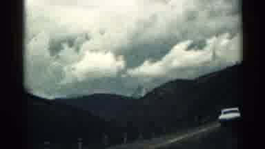 Colorado USA (1963): Car Driving Long Mountain Road In Large Furthermost
