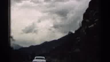 Colorado USA (1963): Scene Of Car Driving Through Mountains And It Is Very Rocky
