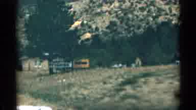 Colorado USA (1963): Driving Down Highway And Taking In Man Signs That Line Rod