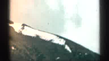 Colorado USA (1963): Driving Mountains Snow Car Man Uphill Thinking Views Clouds